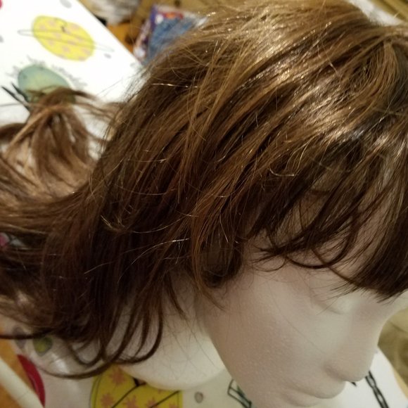A modern edgy shag style is long and luscious with full choppy layers and bangs. main image 12